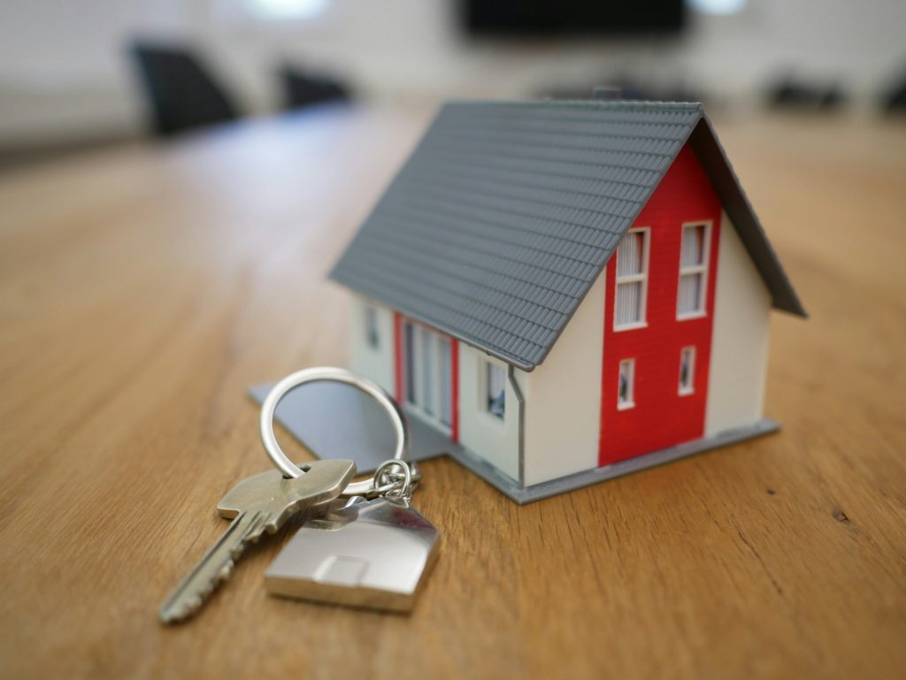 House keys handed over after a successful real estate closing.
